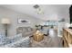 Bright living room with open layout, stylish decor, and views of the dining area at 5041 N Beach Rd # 4A And 4B, Englewood, FL 34223
