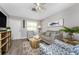 Cozy living room with modern decor, comfortable seating, and plenty of natural light at 5041 N Beach Rd # 4A And 4B, Englewood, FL 34223