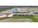 New construction homes in a community featuring ponds and green spaces for a serene living environment at 5132 Schubert Trl, North Port, FL 34287