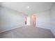 Spacious bedroom with neutral carpeting and ample natural light, ready for personalization at 5132 Schubert Trl, North Port, FL 34287