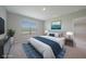 Serene bedroom with plush carpet, a decorative rug, and a window offering views of the surrounding greenery at 5132 Schubert Trl, North Port, FL 34287