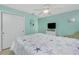 Bedroom with a ceiling fan, tile flooring, and closet storage at 52 Golfview Ter, Rotonda West, FL 33947