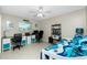 Bedroom featuring a desk area, tile floors, and a ceiling fan at 52 Golfview Ter, Rotonda West, FL 33947