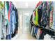 Spacious walk-in closet with built-in storage and ample hanging space for organized wardrobe solutions at 52 Golfview Ter, Rotonda West, FL 33947