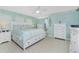 Serene main bedroom with a king bed, ample storage, and coastal decor creating a relaxing retreat at 52 Golfview Ter, Rotonda West, FL 33947