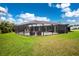 Enjoy this spacious screened in pool and patio area, ideal for entertaining or relaxing in style at 52 Golfview Ter, Rotonda West, FL 33947