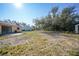 Spacious backyard offering ample space for outdoor activities and potential landscaping projects at 5881 Talbrook Rd, North Port, FL 34287