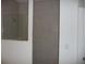 Modern bathroom features tiled shower with glass doors and neutral color scheme at 6998 Dabarsky Ave, North Port, FL 34291