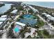 Aerial view of the community featuring tennis courts, a pool, and beach access at 7237 Rum Bay Dr # 5022, Placida, FL 33946