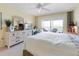 Bright bedroom with a large window leading to an outdoor patio at 7237 Rum Bay Dr # 5022, Placida, FL 33946