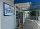 Charming entryway to The Palm Island Club features a convenient access ramp and mailbox station at 7237 Rum Bay Dr # 5022, Placida, FL 33946