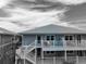 Coastal home with wraparound decks, perfect for enjoying water views and outdoor living at 7237 Rum Bay Dr # 5022, Placida, FL 33946