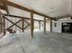 Spacious open garage features wooden support beams and lattice work with secondary golf cart bay at 7237 Rum Bay Dr # 5022, Placida, FL 33946