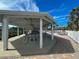 Enjoy outdoor dining in this covered area, complemented by brick pavers and poolside access at 7237 Rum Bay Dr # 5022, Placida, FL 33946