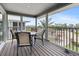 Outdoor dining space on a screened-in porch, perfect for enjoying meals with a view at 7237 Rum Bay Dr # 5022, Placida, FL 33946
