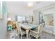 Open dining area seamlessly connects to the living room and kitchen, perfect for entertaining at 8159 Archie St, Englewood, FL 34224