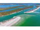 Gorgeous aerial view of pristine beaches and waterways with scenic tropical islands and clear water at 840 E 7Th St, Englewood, FL 34223