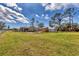 Expansive backyard featuring a shed and plenty of open green space at 840 E 7Th St, Englewood, FL 34223