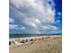 Beach yoga class with rainbow in the sky at 840 E 7Th St, Englewood, FL 34223