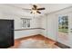 Cozy kitchen featuring terracotta tile flooring, a black refrigerator, and a bright window view at 840 E 7Th St, Englewood, FL 34223