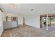 Open concept living room with a breakfast bar, unique flooring and lots of natural light at 840 E 7Th St, Englewood, FL 34223