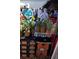Outdoor marketplace featuring fresh pineapples and tomatoes at 840 E 7Th St, Englewood, FL 34223