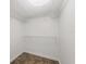 This walk-in closet has wire shelving on the walls and a beautiful tile floor at 840 E 7Th St, Englewood, FL 34223