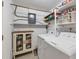 Laundry room with updated appliances and an abundance of storage space at 849 Palmetto St, Englewood, FL 34223