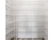 A walk-in closet with white wire shelving on all sides at 9203 Griggs Rd # 204, Englewood, FL 34224