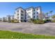 This is an exterior view of the condominium community at 9203 Griggs Rd # A204, Englewood, FL 34224
