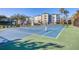 Well-maintained tennis court with lush landscaping at 9203 Griggs Rd # A204, Englewood, FL 34224