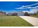 Beautiful single Gathering home featuring a well manicured lawn and a two car garage at 9265 Carnation Ave, Englewood, FL 34224