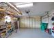 A spacious garage with epoxy floors and ample storage and work space at 9265 Carnation Ave, Englewood, FL 34224