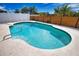 Inviting backyard pool surrounded by a spacious patio, perfect for outdoor entertaining and relaxation at 9265 Carnation Ave, Englewood, FL 34224
