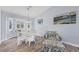 Bright dining area features a glass table and a bay window with plantation shutters at 97 Kettle Harbor Dr, Placida, FL 33946