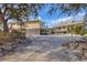The property features a spacious sandy yard, perfect for outdoor activities and enjoying the natural surroundings at 97 Kettle Harbor Dr, Placida, FL 33946