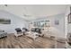Inviting living room with ample seating, natural light, and stylish decor at 97 Kettle Harbor Dr, Placida, FL 33946