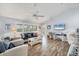 Bright living area featuring comfortable seating, large windows, and modern decor at 97 Kettle Harbor Dr, Placida, FL 33946