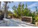 Outdoor shower, bench, palm trees, foliage and sky found at this home near the beach at 97 Kettle Harbor Dr, Placida, FL 33946