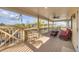 Spacious covered porch with seating and views at 97 Kettle Harbor Dr, Placida, FL 33946