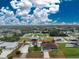 Aerial view with property lines showing the home's location and surrounding neighborhood at 10075 Bay Ave, Englewood, FL 34224