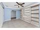Flex room features a built in book case at 10075 Bay Ave, Englewood, FL 34224