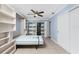 Bedroom with pull down bed and pool access at 10075 Bay Ave, Englewood, FL 34224