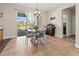 Bright dining area with outdoor views, a coffee bar, and elegant decor at 10498 Bay State Dr, Port Charlotte, FL 33981