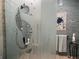 Unique bathroom featuring frosted glass shower door with a seahorse design at 108 Fairway Rd, Rotonda West, FL 33947
