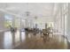 Spacious clubhouse featuring soaring ceilings, abundant natural light, and elegant seating arrangements at 11417 Okaloosa Dr, Venice, FL 34293