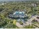 Aerial view of clubhouse and pool, showcasing the community's amenities at 11417 Okaloosa Dr, Venice, FL 34293