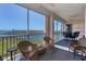 Relaxing balcony seating area with gorgeous water views at 13313 Gasparilla Rd # C501 & Slip 11, Placida, FL 33946