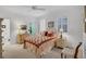 Cozy bedroom features soft carpet, ceiling fan and white plantation shutters for privacy at 13313 Gasparilla Rd # C501 & Slip 11, Placida, FL 33946
