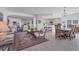 Spacious living area with ample seating, adjacent kitchen, and elegant decor at 13313 Gasparilla Rd # C501 & Slip 11, Placida, FL 33946